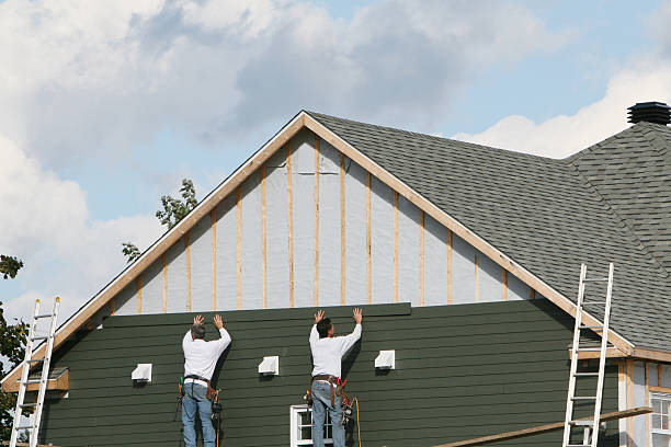 Professional Siding Contractor technician working in Stoughton, MA